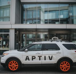 SUV with Aptiv logo and orange rims