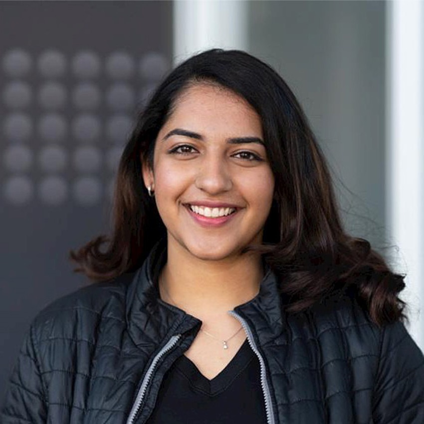 Smiling woman in black jacket