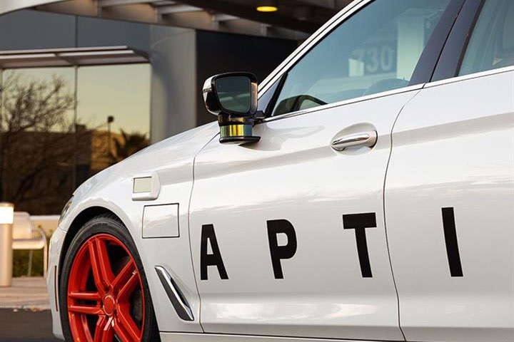 Side view of car with Aptiv logo