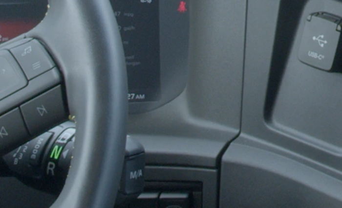 Designing Large-Scale Software for Reuse With an Automotive Company